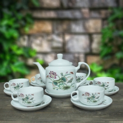 Bộ ấm chén sứ CK quai cong hoa sen (Trắng) Bộ ấm chén sứ CK quai cong hoa sen (Trắng)